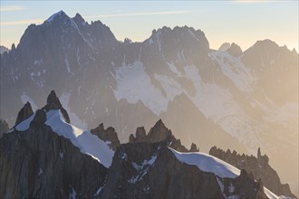 Mountain peak with glacier at sunrise, Mont Blanc massif, French Alps, Chamonix, France, Europe