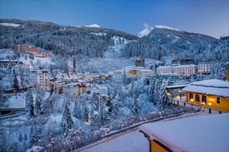 Deep snowy winter panorama of the village at dusk, Bad Gastein, Gastein Valley, Hohe Tauern