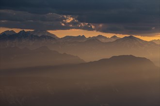 Thunderstorm mood over mountains, backlight, summer, view from Schlern to Ortler group, Dolomites,