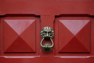 Door knocker on a red front door, Roscoff, Finistere, Brittany, France, Europe