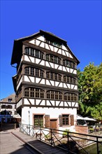 Strasbourg, France, September 2023: Traditional European style half timbered frame house at River
