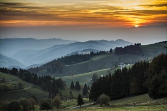 Hilly landscape, sunset, view from Schauinsland into Muenstertal, near Freiburg im Breisgau, Black