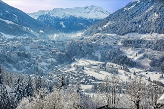 Winter landscape with view into the valley to the village and Radhausberg 2613m from the Gasteiner