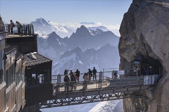 Tourists on viewing platform in front of mountains, mountain station, Aiguille du Midi, Mont Blanc