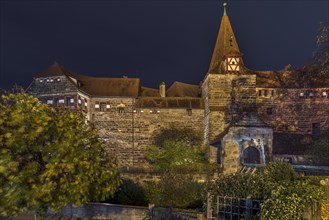 Wenzelburg or Laufer Kaiserburg, illuminated at night, rebuilt by Emperor Charles IV in 1556,