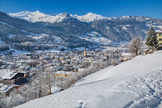 Winter panorama of the village from the Gasteiner Hoehenweg with Goldberg group, Bad Hofgastein,