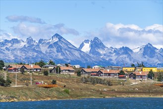 Architecture in the city of Ushuaia, behind the mountains of the island Hoste Chile, island Tierra