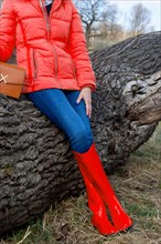 Woman with red rubber boots