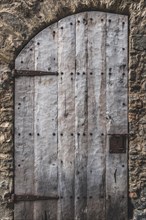 Door detail in Rupit, one of the best known medieval towns in Catalonia in Spain