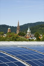 City view, PV system in the foreground, Freiburg im Breisgau, Black Forest, Baden-Wuerttemberg,