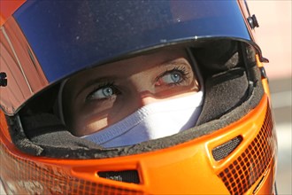 Racer with helmet and balaclava