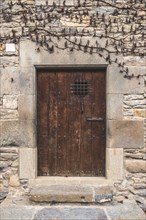 Detail of a door in a medieval house in Rupit in Catalonia Spain