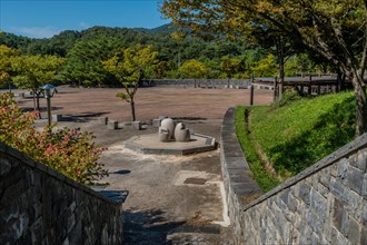 Landscape of concrete plaza with decorative drinking fountains in public park in South Korea