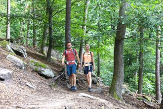 Symbolic image: Young couple hiking in the Palatinate Forest, here on the fifth stage of the