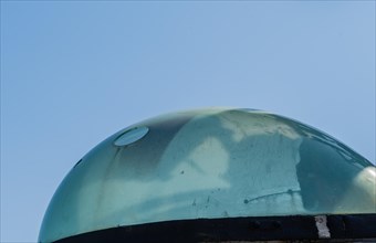 Plexiglass dome covering the slewing sight on battleship gun fire-control system on display public