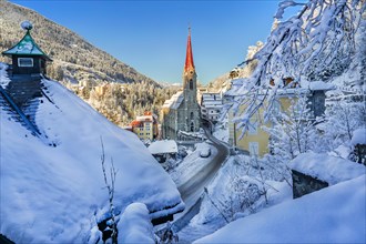 Parish church in the snow-covered town centre, Bad Gastein, Gastein Valley, Hohe Tauern National