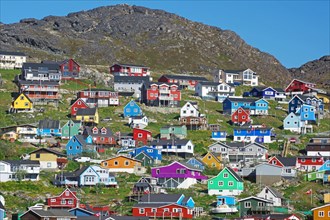Colourful wooden houses, barren mountains, Qaqortoq, Greenland, Denmark, North America