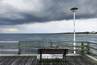 Bench on a dilapidated jetty on the Baltic Sea coast, sea, Baltic Sea, holiday, gloomy, depressive,