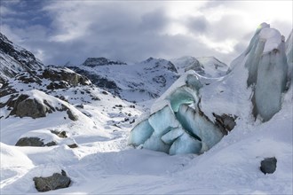 Glacier tongue in front of a mountain peak, snow, winter, Morteratsch glacier, Pontresina, Engadin,
