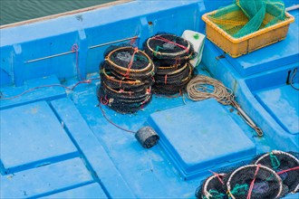 Crab traps on deck of fishing trawler in Yeosu, South Korea, Asia