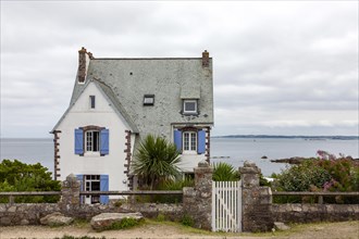 House by the sea, near Roscoff, Finistere, Brittany, France, Europe