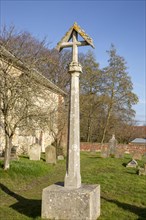 Churchyard with graves village church of Saint Michael Tunstall, Suffolk, England, UK