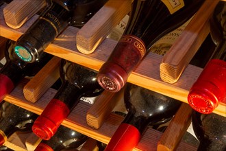 Wine cellar with red wine bottles (editorial)