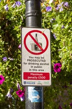 Sign warning about prosecution for drinking alcohol in public area, Newbury, Berkshire, England, UK