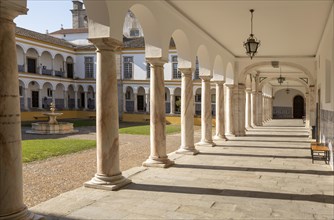 Cloisters collonade marble columns historic courtyard Evora University, Evora, Alto Alentejo,
