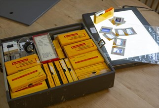 Yellow films storage boxes holding Kodachrome vintage transparency slides dating from 1960s with