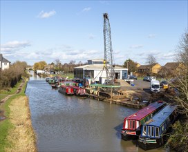 Narrowboats and crane, ABC Leisure Group boatyard, Kennet and Avon canal, Hilperton marina,