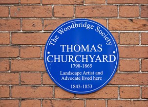 Blue wall plaque Thomas Churchyard 1798-1865, Woodbridge, Suffolk, England, UK The Woodbridge
