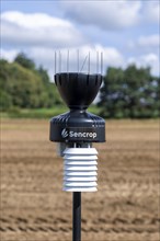 Sencrop Raincrop V14 agricultural weather station equipment in farm field, Sutton, Suffolk,