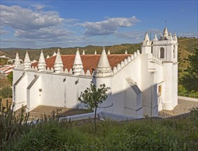 Architectural details of conical roof decorations historic whitewashed church Igreja Matrix in