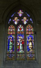 Stained glass window Faith, Hope, Charity priory church at Edington, Wiltshire, England, UK 1866 by