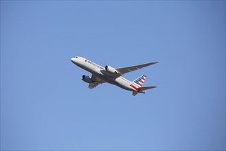 A passenger aircraft of the US airline American Airlines takes off from Frankfurt Airport