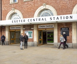 People outside Exeter Central Station railway station, Exeter city centre, Devon, England, UK