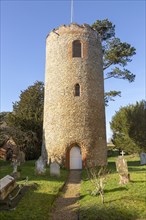Unusual detached round tower in churchyard of church of Saint Andrew, Bramfield, Suffolk, England,