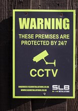 Warning premises protected by CCTV sign, UK