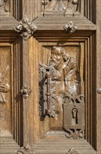 Historic carvings on wooden church door, Santa Maria la Mayor, Ezcaray, La Rioja, Spain, Europe