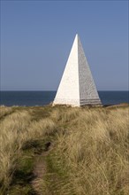 Emmanuel Head white pyramidal navigation beacon, Holy Island, Northumberland, England, UK built