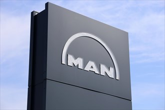 MAN logo (MAN Truck & Bus Service, Kaiserslautern) . The VW subsidiary MAN wants to cut up to 9,