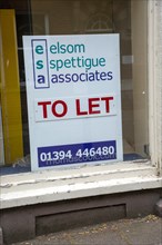 To Let estate agent sign in empty shop window, Elsom Spettigue Associates, Woodbridge, Suffolk,