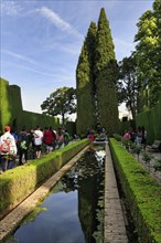 Tourists, Strollers in gardens with water basin, Generalife Gardens, Alhambra, UNESCO World