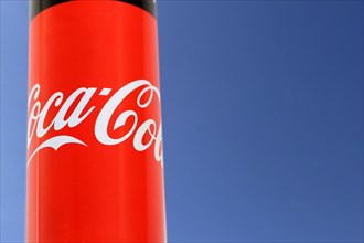 Composing of a can of Coca-Cola and a blue sky as background