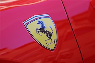 Ferrari logo on a red Ferrari