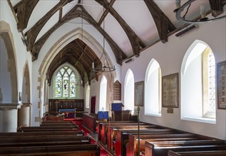 Church of Saint Peter, Holton, Suffolk, England, UK interior nave, chancel arch altar, east window