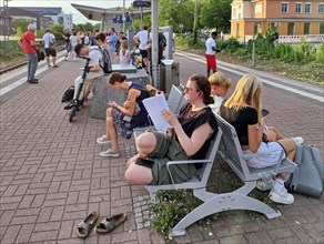 Many people waiting on the platform for the train, Luenen Central Station, North Rhine-Westphalia,