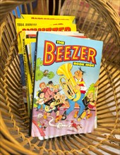 1980s children's cartoon comic annuals the Beezer annual book 1986, inside antiques centre,
