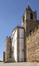 Matriz church in walls of historic ruined castle at Mourao, Alentejo Central, Evora district,